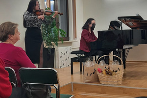 Występ młodego artysty- ucznia  Państwowej   Szkoły Muzycznej w Kościanie przy akompaniamencie naucz